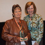 Photo: (Left) Deb Hufty holding the Keystone Award  (Right) Jane Wear, President/CEO at Cardinal Services