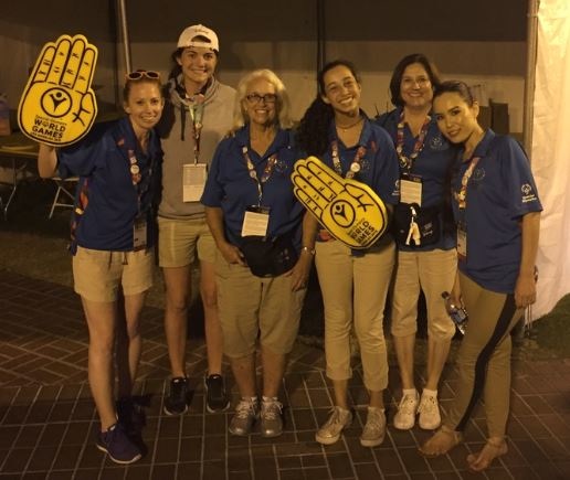 Madison Seifer and others at an information booth at the 2015 Special Olympic Games. Photo Credit: Bridging Our Circle of Friends website
